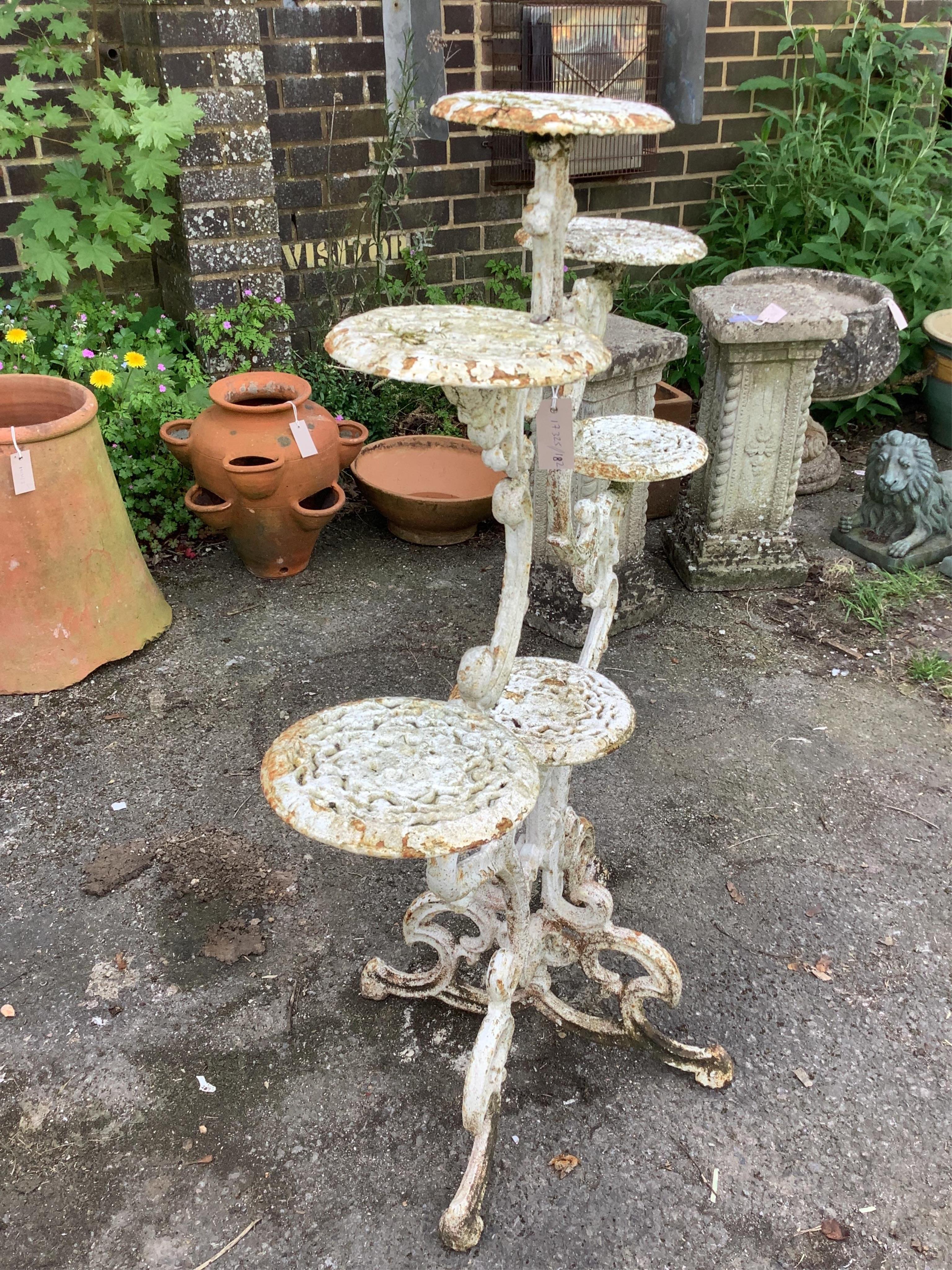 A Victorian style cast iron pot stand, height 101cm
